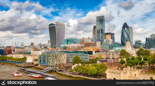 London modern skyline along river Thames on a beautiful sunny day.