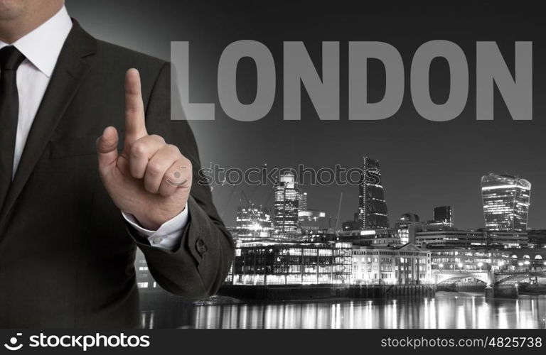 London skyline at night with businessman concept . London skyline at night with businessman concept.