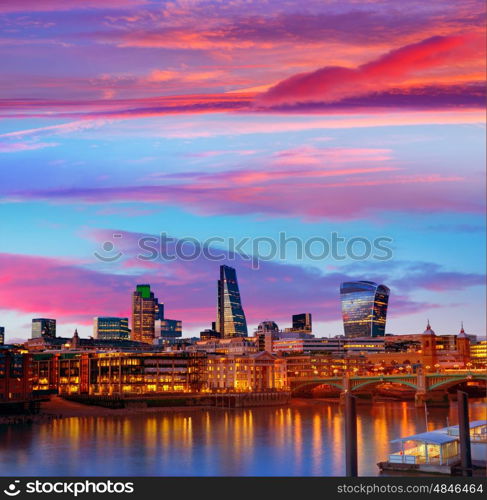 London skyline sunset on Thames river reflection at UK