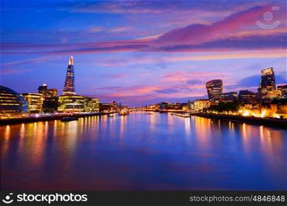 London skyline sunset with City Hall and financial on Thames river