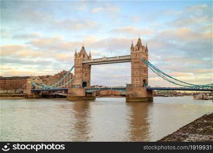 London skyline with Tower Bridge at twilight in UK.