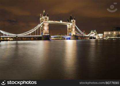 London Tower bridge on sunset illuminated with different colors