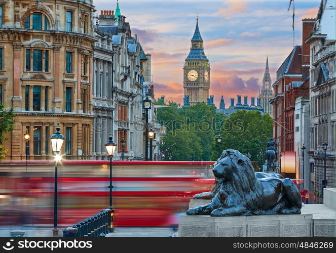 London Trafalgar Square lion and Big Ben tower at background