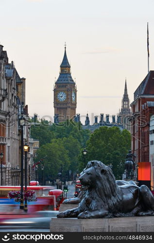 London Trafalgar Square lion and Big Ben tower at background