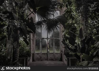 London, UK - Apr 9, 2019 : Beautiful exit door of Palm House at Kew Gardens (Royal Botanic Gardens).