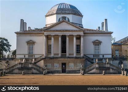LONDON, UK - MAR 31, 2019 : Front of Chiswick House on West London, Uk. Chiswick House is a magnificent neo Palladian villa set in beautiful historic gardens.