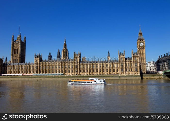 London view, Big Ben, Parliament, boat and river Thames