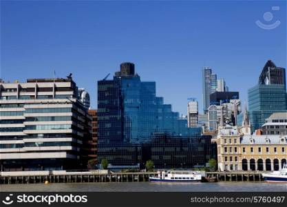 London view, river thames, some old and new buildings