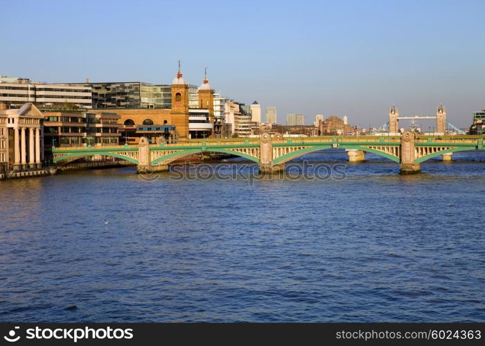 London view, river thames with some old and new buildings