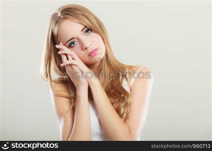 Loneliness negative emotion concept. Young sad stressed woman closeup