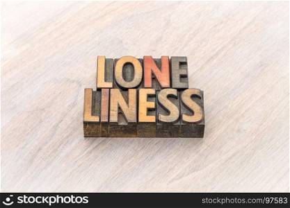 loneliness word abstract in vintage letterpress wood type
