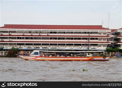 Long boat on the Chao Phraya river in Bangkok, Thailand
