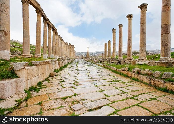 long colonnaded street or cardo in antique town Jerash in Jordan