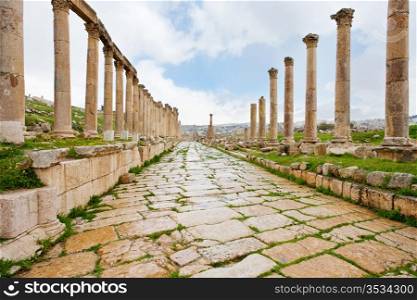 long colonnaded street or cardo in antique town Jerash in Jordan