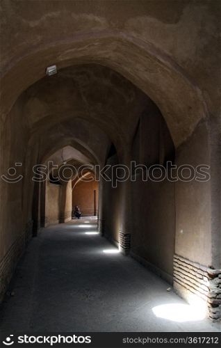 Long corridor in old town Yazd, Iran