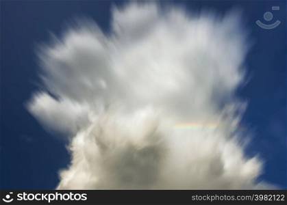 long exposure clouds with rainbow clear sky. long exposure clouds