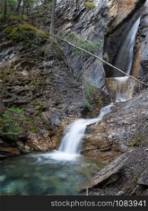 Long exposure image of an idyllic small waterfall within the Yoho National Park, British Columbia, Canada