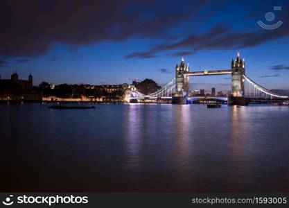 Long exposure image of Tower Bridge, London just before sunrise