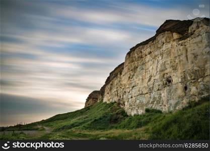 Long exposure landscape of blur sky over vibrant cliffs