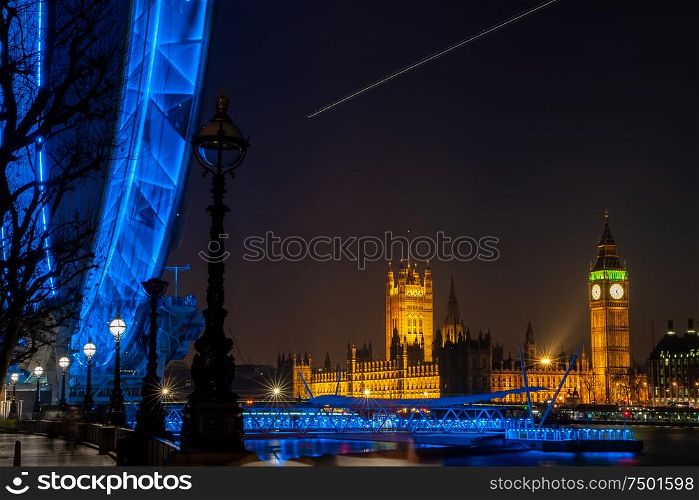 Long exposure of Big Ben, Houses of Parliament, Westminster Bridge, London Eye at Night, London England