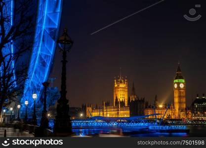 Long exposure of Big Ben, Houses of Parliament, Westminster Bridge, London Eye at Night, London England
