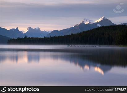 Long exposure panoramic image of the Maligne Lake close to Jasper with early morning mood, Alberta, Canada