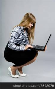 long-haired girl with the laptop