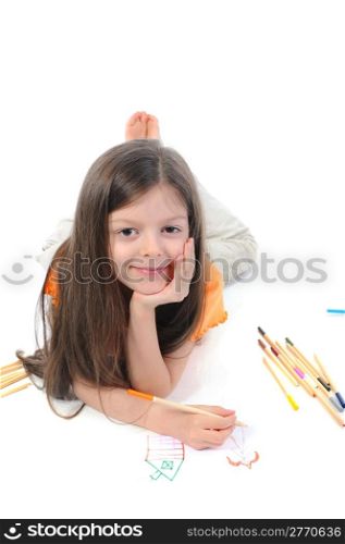 Long-haired little girl draws a princess. Isolated on white background