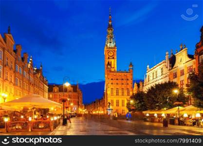 Long Market Street with Town Hall and Neptune statue at night in Main City of Gdansk, Poland