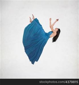 long shot brunette woman dress levitating