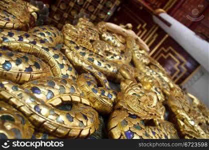 Long snake sculpture inside temple in wat Chang Taem, Chiang Mai, Thailand