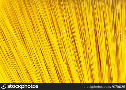 Long spaghetti arranged at background