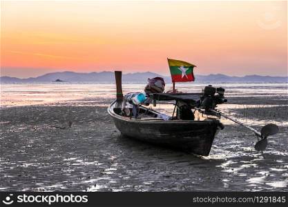 Long tail boat flying the Myanmar flag, Phang Nga Bay, Phuket, Thailand