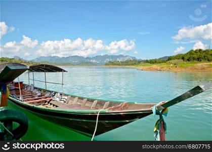 Long-tail boat waiting for the tourists at Ratchaprapa or Chiao Lan Dam in Surat Thani Province of Thailand