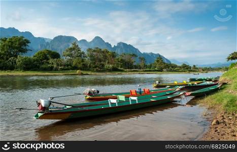 long tail boats on Song river, Vang Vieng,Laos.