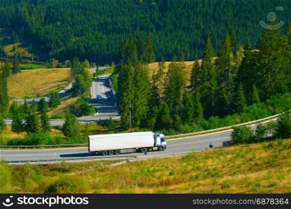 Long vehicle truck on a mountains road in Romania