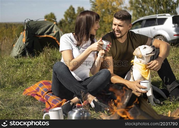 long view cute couple dog spending time outdoors