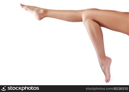Long woman legs isolated on white