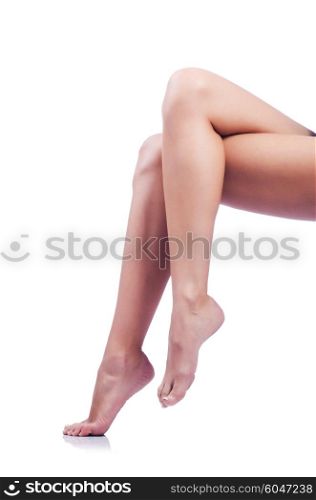 Long woman legs isolated on white