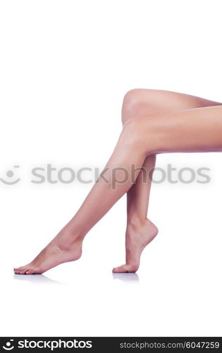 Long woman legs isolated on white