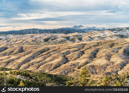 Longs Peak and Colorado foothills from Horsetooth Rock trail near Fort Collins, late fall scenery with some snow