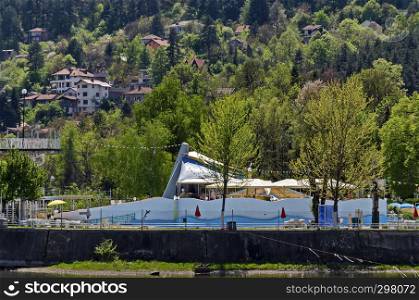 Look toward environment of springtime picturesque dam with mineral baths and resort village Pancharevo in Plana mountain, Sofia, Bulgaria