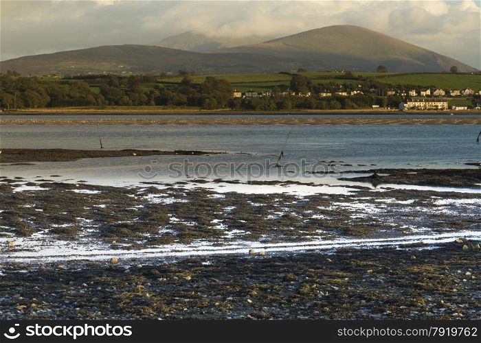 Looking East across the Menai Straits to Snowdonia, from Anglesey, North Wales, United Kingdom.