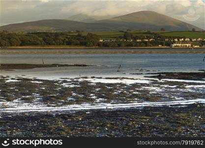 Looking East across the Menai Straits to Snowdonia, from Anglesey, North Wales, United Kingdom.