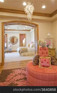 Looking into a bedroom interior from adjoining room