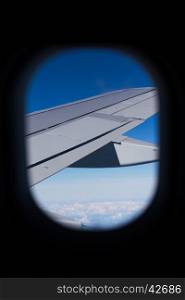 Looking Out of an Airplane Window on the engine and wing