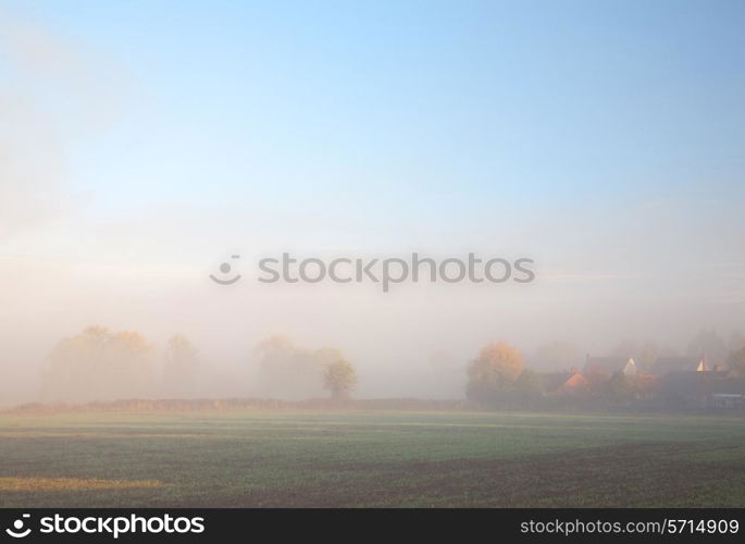 Looking over farmland towards suburbia, Mickleton, Gloucestershire, England.