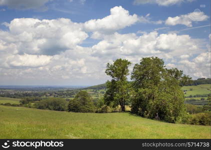 Looking over the rolling hills towards the Cotswold town of Winchcombe near Cheltenham, Gloucestershire, England.