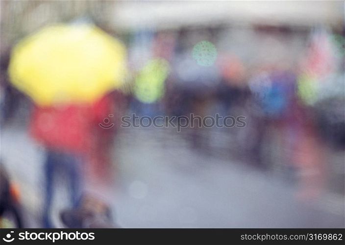 Looking Through A Hazy Screen At A Rainy Street Scene
