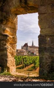 Looking through the great wall at saint emilion, remnant of domenican monastery, Aquitaine, France